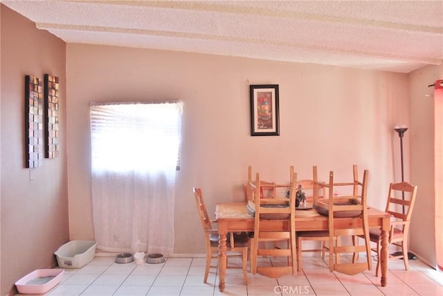 10343 Amherst Ave, Montclair, CA 91763 - dining area featuring tile patterned floors and a textured ceiling