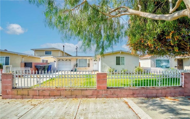3232 W 187th St, Torrance, CA 90504 - view of front of property with stucco siding, a garage, and a fenced front yard