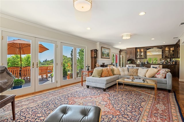 17248 Barneston Ct, Granada Hills, CA 91344 - living room with healthy amount of natural light, french doors, recessed lighting, crown molding, and wood finished floors