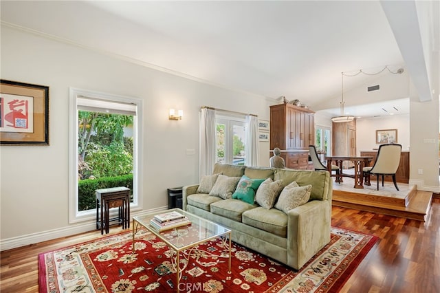 17248 Barneston Ct, Granada Hills, CA 91344 - living area with plenty of natural light, dark wood-style flooring, lofted ceiling, and crown molding