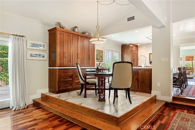 17248 Barneston Ct, Granada Hills, CA 91344 - dining area with light wood finished floors, ornamental molding, and lofted ceiling