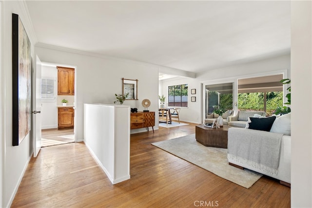 14819 San Feliciano Dr, La Mirada, CA 90638 - living room with light wood-style flooring and crown molding