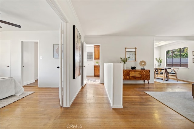 14819 San Feliciano Dr, La Mirada, CA 90638 - hallway with light wood-style flooring and ornamental molding