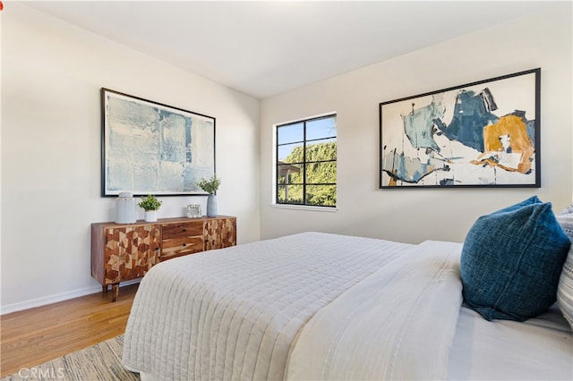 14819 San Feliciano Dr, La Mirada, CA 90638 - bedroom featuring wood finished floors and baseboards
