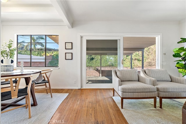 14819 San Feliciano Dr, La Mirada, CA 90638 - living room with light wood finished floors, ornamental molding, and beam ceiling