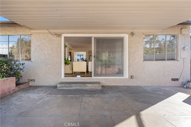 14819 San Feliciano Dr, La Mirada, CA 90638 - entrance to property featuring stucco siding and a patio area