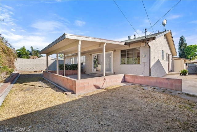 14819 San Feliciano Dr, La Mirada, CA 90638 - back of house featuring stucco siding