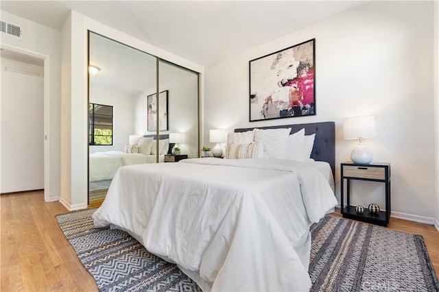 14819 San Feliciano Dr, La Mirada, CA 90638 - bedroom featuring a closet and wood finished floors