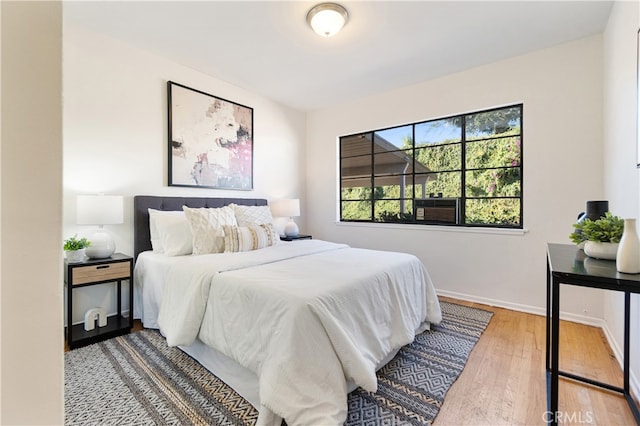 14819 San Feliciano Dr, La Mirada, CA 90638 - bedroom featuring wood finished floors and baseboards