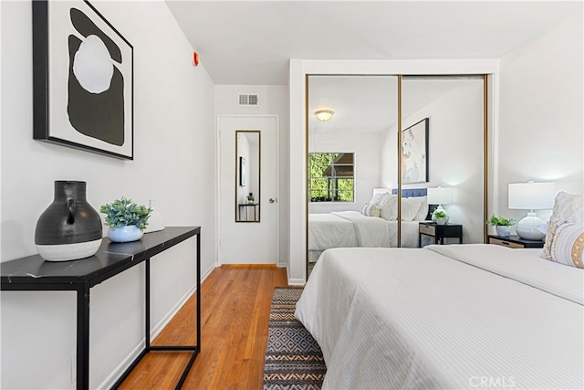 14819 San Feliciano Dr, La Mirada, CA 90638 - bedroom with wood finished floors and a closet