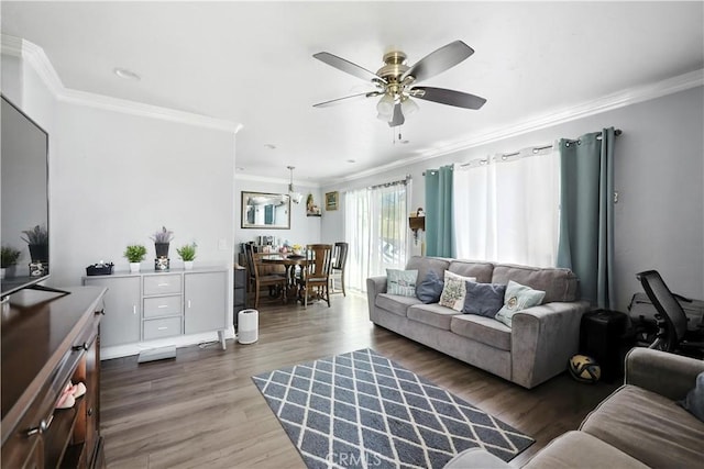 13643 Alcade St, La Puente, CA 91746 - living room with ornamental molding, a ceiling fan, wood finished floors, and a chandelier