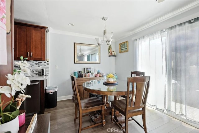 13643 Alcade St, La Puente, CA 91746 - dining area with crown molding and light wood finished floors