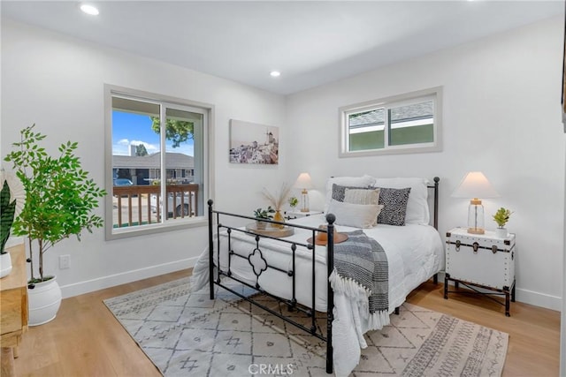 5621 E Carita St, Long Beach, CA 90808 - bedroom featuring multiple windows, wood finished floors, and recessed lighting