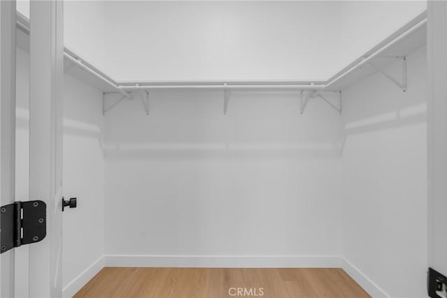 5621 E Carita St, Long Beach, CA 90808 - walk in closet featuring light wood-style flooring