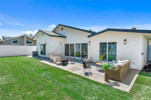5621 E Carita St, Long Beach, CA 90808 - rear view of house with stucco siding, an outdoor living space with a fire pit, and a patio