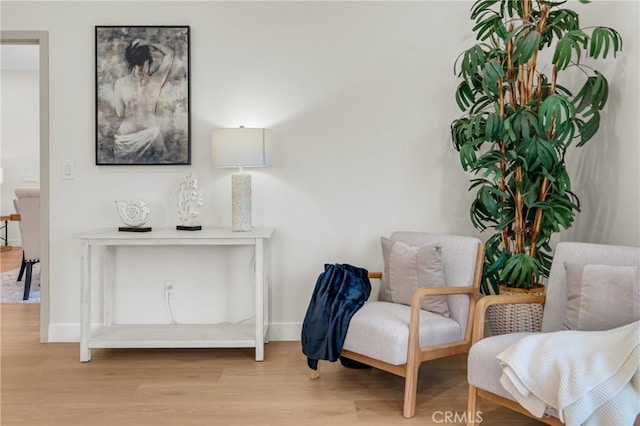 5621 E Carita St, Long Beach, CA 90808 - sitting room featuring wood finished floors and baseboards