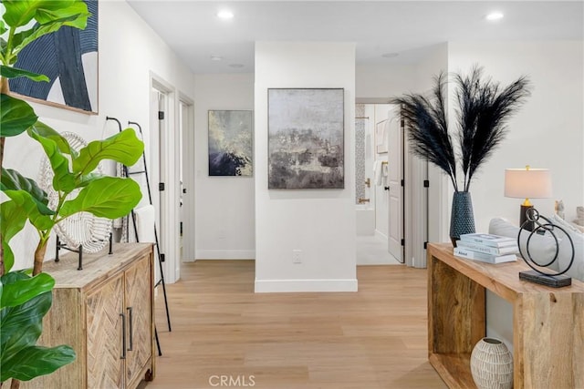5621 E Carita St, Long Beach, CA 90808 - corridor featuring light wood finished floors and recessed lighting