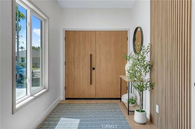 5621 E Carita St, Long Beach, CA 90808 - entryway featuring light wood finished floors and baseboards