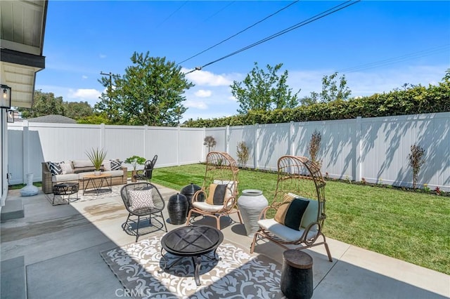 5621 E Carita St, Long Beach, CA 90808 - fenced backyard with a patio area and an outdoor living space with a fire pit
