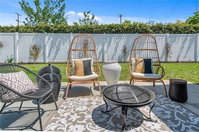 5621 E Carita St, Long Beach, CA 90808 - fenced backyard with a patio and a fire pit