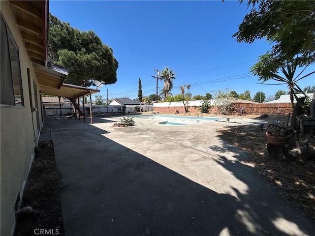 6910 Bellaire Ave, North Hollywood, CA 91605 - view of pool with a patio and a fenced backyard