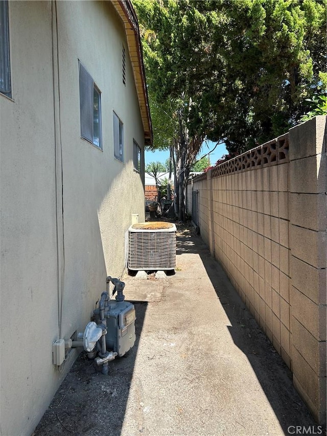 6910 Bellaire Ave, North Hollywood, CA 91605 - view of home's exterior featuring a central AC unit and stucco siding