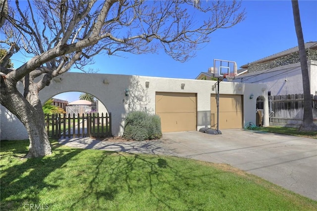 560 S 12th St, Grover Beach, CA 93433 - view of front of home with stucco siding and concrete driveway