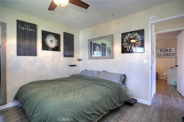 560 S 12th St, Grover Beach, CA 93433 - bedroom featuring wood finished floors, a textured ceiling, and a ceiling fan