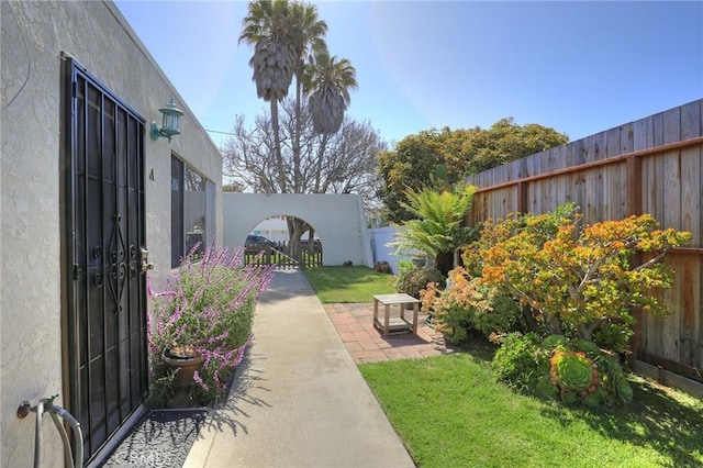 560 S 12th St, Grover Beach, CA 93433 - fenced backyard featuring a patio area