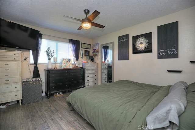560 S 12th St, Grover Beach, CA 93433 - bedroom with wood finished floors, a textured ceiling, and ceiling fan