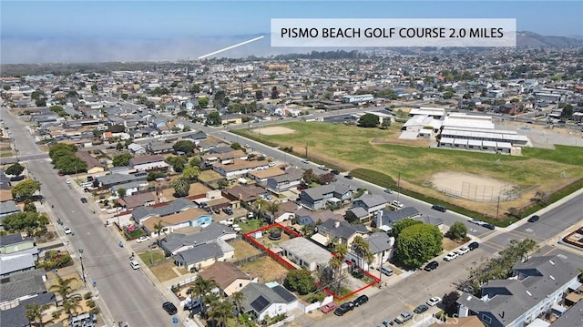 560 S 12th St, Grover Beach, CA 93433 - aerial view of residential area featuring property boundaries highlighted