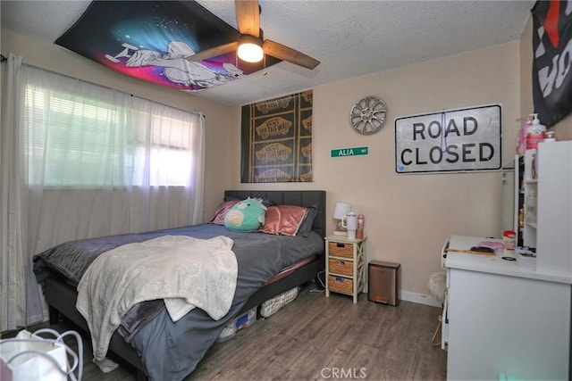 560 S 12th St, Grover Beach, CA 93433 - bedroom with wood finished floors, ceiling fan, and a textured ceiling