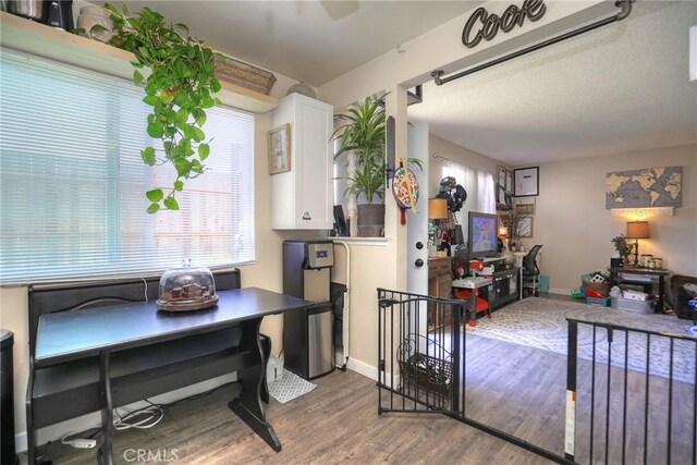 560 S 12th St, Grover Beach, CA 93433 - dining area featuring wood finished floors and baseboards