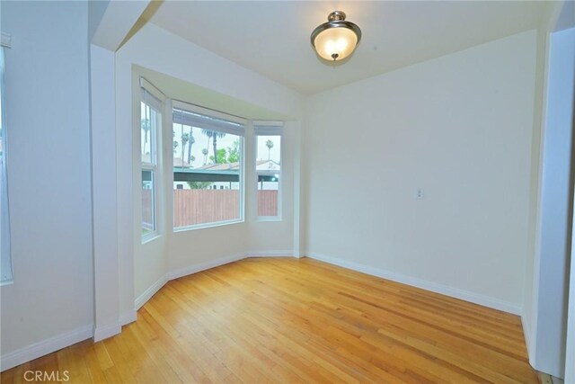 517 E Washington Blvd, Pasadena, CA 91104 - empty room with light wood-style flooring and baseboards