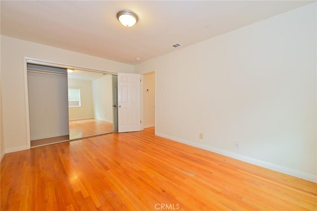 517 E Washington Blvd, Pasadena, CA 91104 - unfurnished bedroom featuring a closet and light wood-style floors