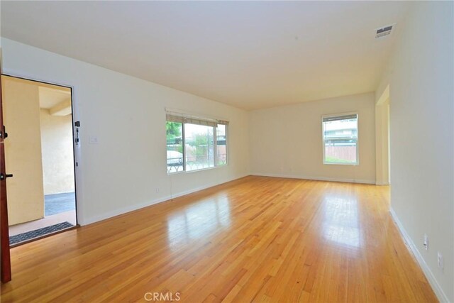 517 E Washington Blvd, Pasadena, CA 91104 - unfurnished room featuring light wood-style flooring and baseboards