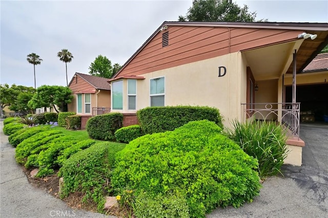 517 E Washington Blvd, Pasadena, CA 91104 - view of side of home featuring stucco siding