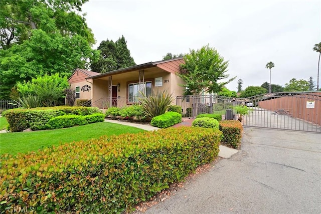 517 E Washington Blvd, Pasadena, CA 91104 - view of front of property with stucco siding and a gate