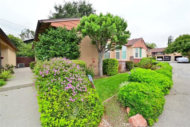 517 E Washington Blvd, Pasadena, CA 91104 - view of property hidden behind natural elements with stucco siding