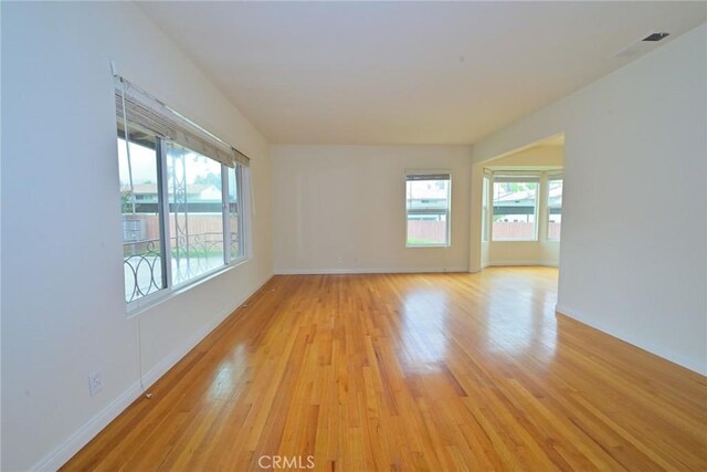 517 E Washington Blvd, Pasadena, CA 91104 - unfurnished room featuring healthy amount of natural light and light wood finished floors