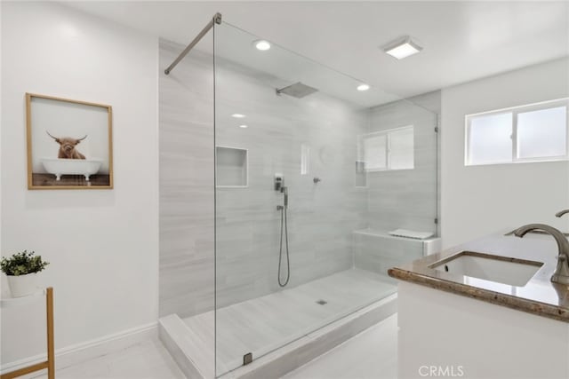 23414 Clarendon St, Woodland Hills, CA 91367 - full bathroom with a walk in shower, double vanity, and recessed lighting