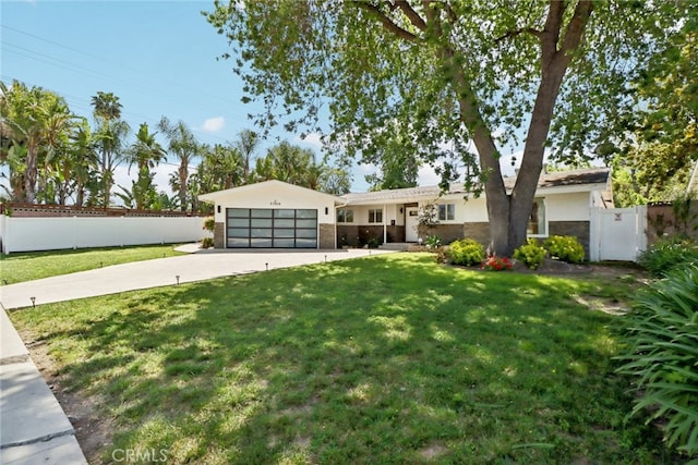 23414 Clarendon St, Woodland Hills, CA 91367 - ranch-style house with concrete driveway, an attached garage, stucco siding, and stone siding