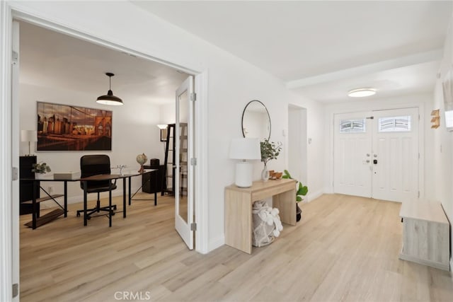 23414 Clarendon St, Woodland Hills, CA 91367 - entrance foyer with light wood-style floors and baseboards