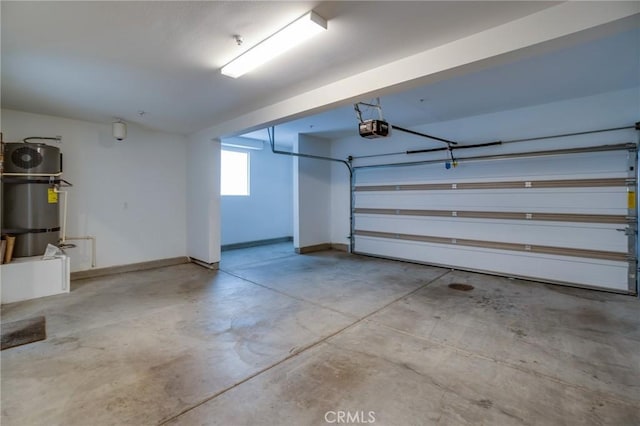 2823 Lily Ln, El Monte, CA 91733 - garage with a garage door opener and a central vacuum unit
