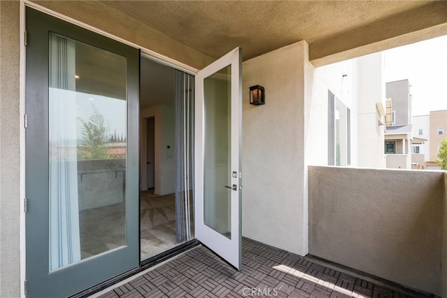2823 Lily Ln, El Monte, CA 91733 - property entrance with stucco siding and a balcony