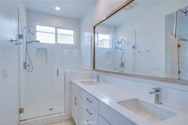 2823 Lily Ln, El Monte, CA 91733 - bathroom featuring a stall shower, double vanity, and recessed lighting