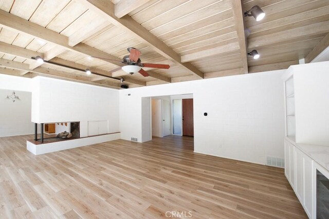 2158 N Ave, Chico, CA 95926 - unfurnished living room featuring a wood ceiling with exposed beams, light wood-type flooring, and a ceiling fan
