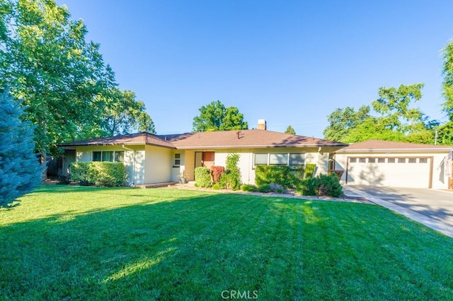 2158 N Ave, Chico, CA 95926 - single story home with a garage, driveway, a front lawn, and a chimney