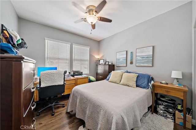 15655 Vista Way Unit 100, Lake Elsinore, CA 92532 - bedroom with wood finished floors, an office area, and a ceiling fan