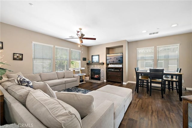 15655 Vista Way Unit 100, Lake Elsinore, CA 92532 - living area featuring ceiling fan, dark wood-style flooring, a tiled fireplace, and recessed lighting